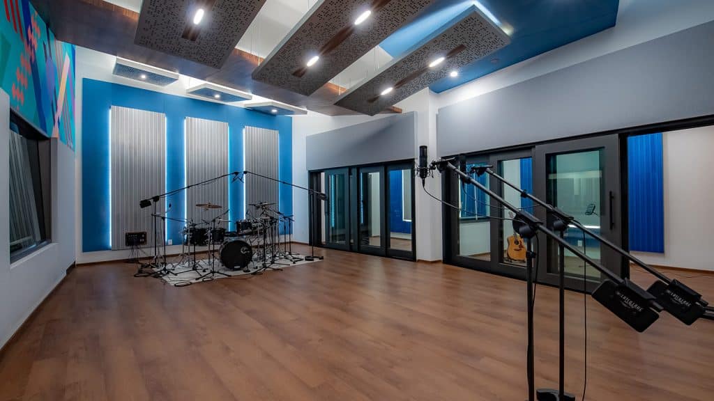 Sonic Den studio room with drums
